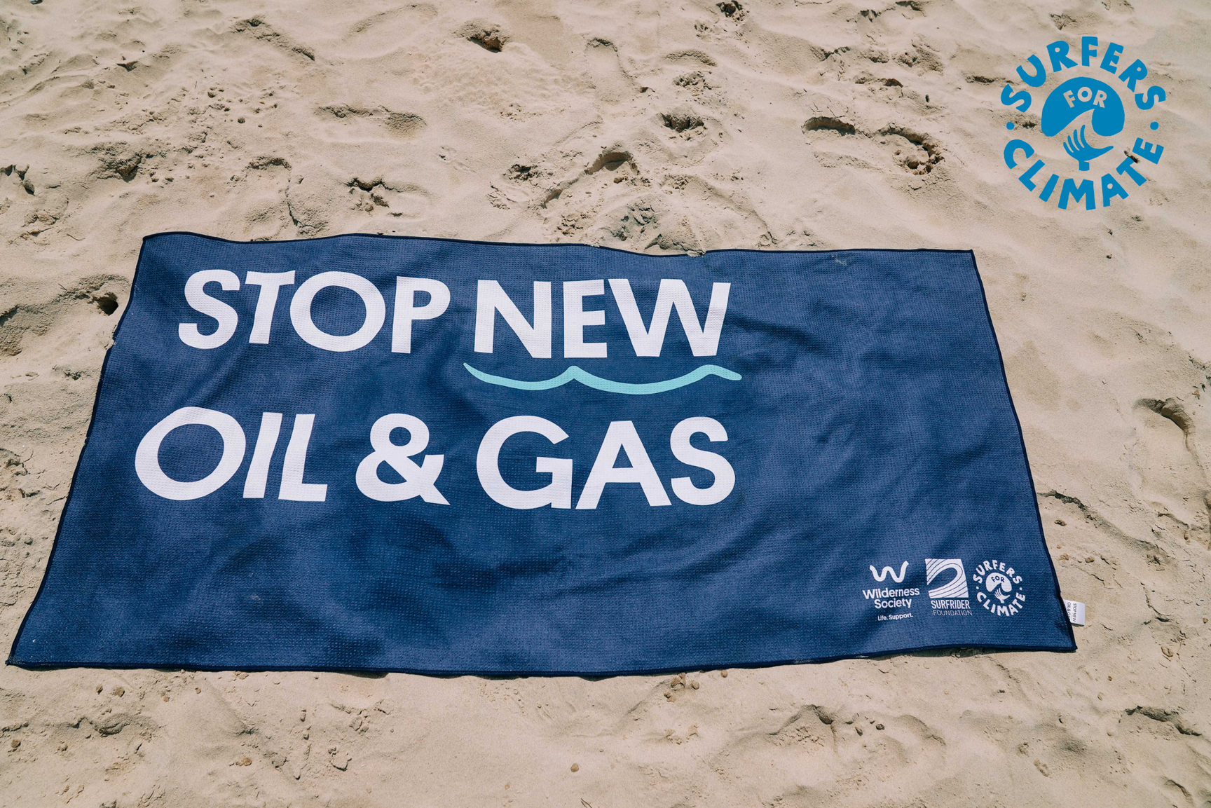 Stop New Oil & Gas 100% Recycled Beach Towel. In collaboration with Wilderness Society, Surfers for Climate and Surfrider Foundation Australia - coming together to fight the threat to our beaches and oceans. To fight climate change.